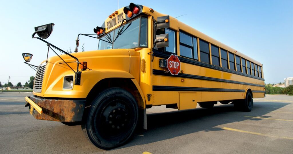 yellow school bus parked in daylight